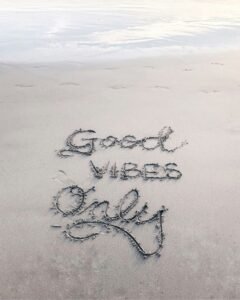 Good Vibes Only sand text